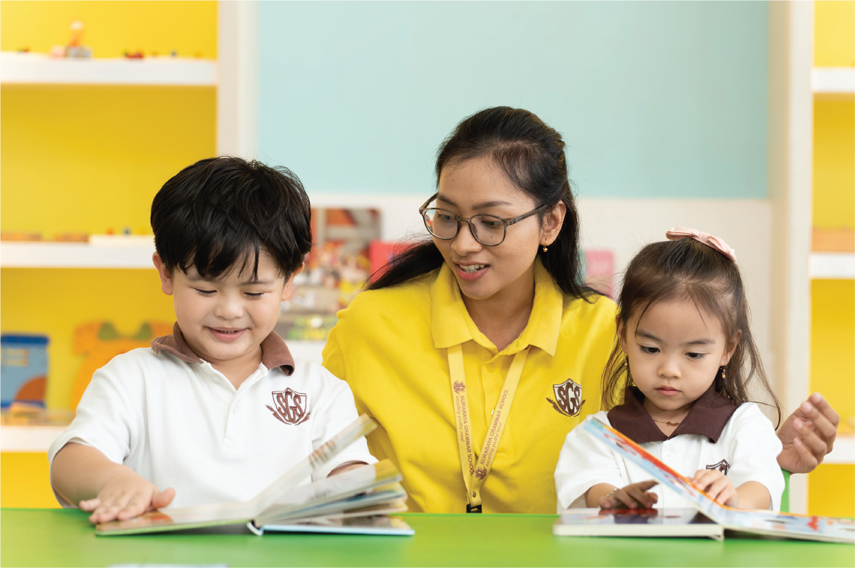 Surabaya Grammar School Student And Teacher